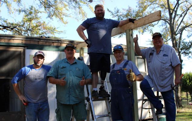 Military veterans from left, Thomas Goode, Dan Curtis, David Goode, Ed Scisson and Ed Chaulk helped with repairs on a home over the last week. Photos by Britne Hammons