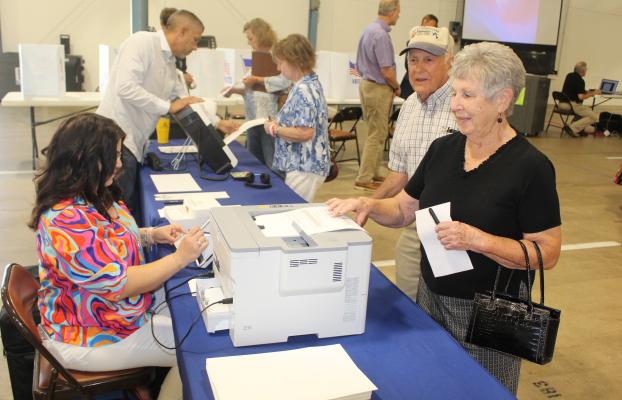 Donna Rakestraw of Canton was among around 100 registered voters in Van Zandt County that participated in the voting process June 22 at the VZC Public Election Equipment Demonstration at the Canton Civic Center. Two companies sent representatives and equipment to the demonstration as VZC continues the process of evaluating new election/voting equipment. Photo by David Barber