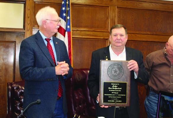 Retiring Van Zandt County Judge Don Kirkpatrick received an appreciation plaque from the VZC Commissioners Court during its regular meeting Dec. 21. The plaque was presented to Kirkpatrick by VZC Pct. 2 Commissioner Virgil Melton Jr. on behalf of the commissioners’ court. Kirkpatrick will leave office on Dec. 31 prior to new VZC Judge Andy Reese taking the oath of office on Jan. 1. Photo by David Barber