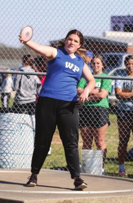 Tiger track and field athletes finished second overall in the varsity boys division and sixth overall in the varsity girls division of the Bluebird Relays. Photo by Regina DeDominicis