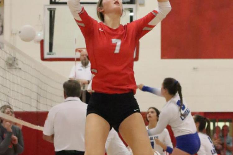 Bella Thompson delivers an acrobatic set during Van’s pool play sweep over the Cumby Lady Trojans. Thompson would play a key role in the victory, finishing with a match-high 10 kills. Photo by David Kapitan