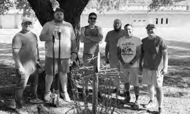 Disc golf players try out the new TVCC course.