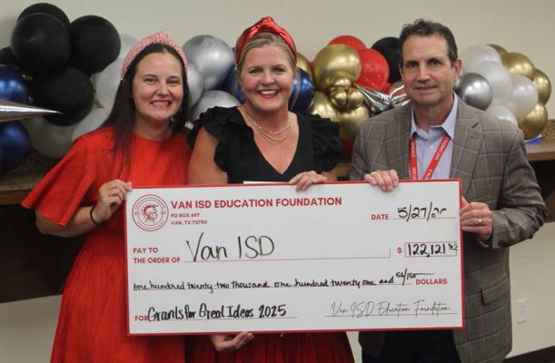 The Van ISD Education Foundation presented a donation check to Van ISD totaling $122,121.56. The check presentation was made May 27 during the regular monthly meeting of the Van School Board. Presenting the donation check were Van ISD Education Foundation Executive Director Annie Byrd (middle) and Foundation Vice-President Stephanie Harris. Accepting the donation check was Van ISD Superintendent Don Dunn. Photo by David Barber