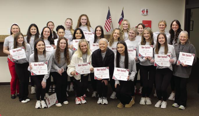 The Van High School cheerleaders, coached by Elizabeth Harvey, were recognized by the Van School Board during its regular monthly meeting Jan. 29 for finishing in 11th place recently at the State Spirit Competition. Photo by David Barber