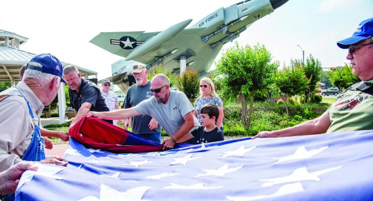 The Van Zandt County Veterans Memorial will change their flag to the larger ‘ceremony’ flag provided by the Reese family. Anyone available is welcome to join the VZC Veterans Memorial in changing out the flag starting at noon Saturday, May 25. Also, anyone interested in helping to set up chairs for the 10 a.m. Memorial Day program at the VZC Veterans Memorial, please report at 8 a.m. Monday, May 27. Story on 2A. Photo by Faith Caughron