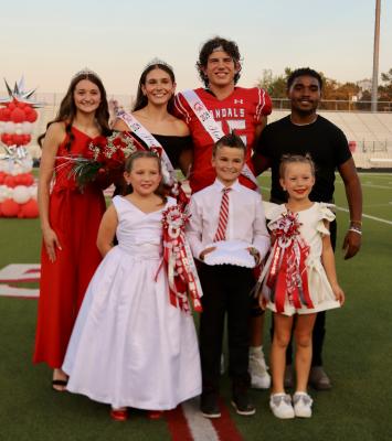 Prior to kickoff of the Homecoming football game between the Van Vandals and the Sunnyvale Raiders at Van’s Memorial Stadium Sept. 20, Trinity Chapman (second from left in back row) was named as the 2024 Van High School Homecoming Queen and starting left offensive tackle Cooper Hullum (second from right in back row) was selected as the VHS Homecoming King. Photo courtesy of the Van High School Journalism Department