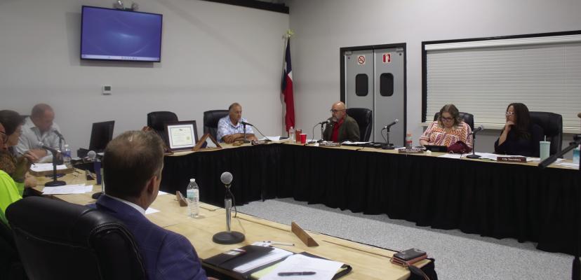 The Van City Council held its regular monthly meeting Nov. 14 as they heard a ‘State of the City’ address from Interim City Manager Jeff Hudgens. Those in attendance included left to right within the half-circle, City Attorney Blake Armstrong: Council Members Charles Ryan and Samantha Smith; Hudgens; Van Mayor Pro-Tem and Acting Mayor Ernie Burns; Council members Mark Heatwole and Laura Duncan; and City Secretary Sereca Huff-Huggins. Photo by Susan Harris