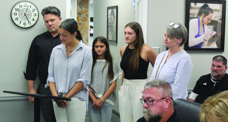Mackenzie Turner, a Wills Point ISD parent, with family members at her side, voiced her support for the Wills Point School Board to approve a policy allowing homeschool participation in extracurricular activities in Wills Point ISD. Turner spoke during the ‘public comments’ portion of the regular monthly meeting of the Wills Point School Board July 14. Photo by David Barber