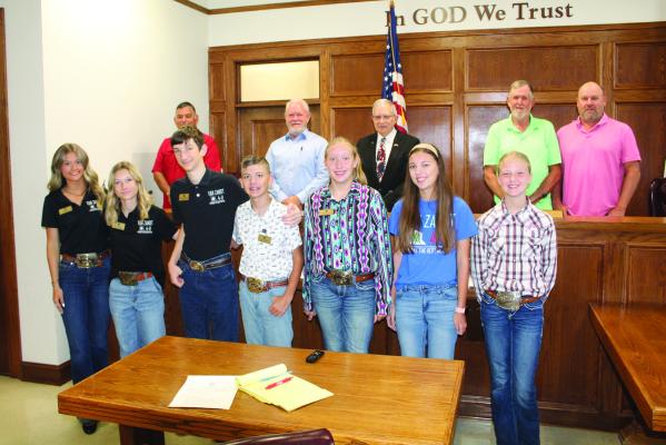 National FFA Week was recognized by the Van Zandt County Commissioners’ Court during its special called meeting Sept. 18. The members of the VZC 4-H club were introduced by VZC Texas A&amp;M AgriLife’s Leon Watson and VZC 4-H Club President Harper Ellis, who read the proclamation prior to unanimous approval by the commissioners’ court. Photo by David Barber