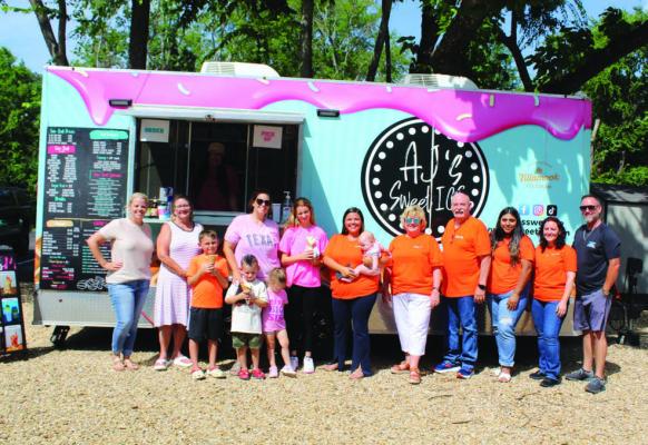 Exit Realty Pro and M-Squared Management L.L.C. in Canton held a Customer Appreciation Event at their business locations July 2. A.J.’s Sweet Ice, located in Grand Saline, was in attendance to serve snow cones and ice cream cones. Photo by David Barber