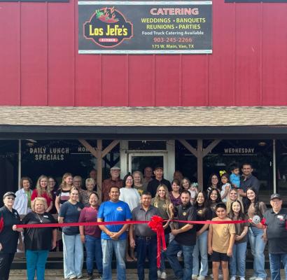The Van Area Chamber of Commerce held a ribbon-cutting June 3 for Los Jefe’s Kitchen, located at 175 West Main Street in downtown Van. Among those in attendance were Luis Reyes (with scissors), the owner of Los Jefe’s Kitchen. Others shown were left to right, business partner Santos Benitez, Amy Reyes and son, Juan Reyes, to the right of Luis Reyes. Also shown were Van Area Chamber of Commerce Directors Jane Burns, Mike Bowers, Pat Valentine, Lisa Mays-Gonzalez, and City of Van Economic Development Corporat