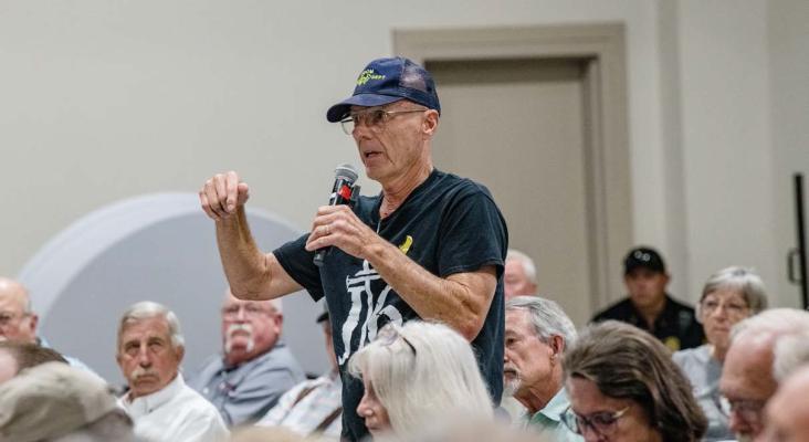 Republican Club of Van Zandt County President Doc Collins was one of several in attendance asking questions during a Town Hall Meeting June 6 hosted by United States District 5 Congressman Lance Gooden at the VZC Farm Bureau Event Center in Canton. Photo by Faith Caughron