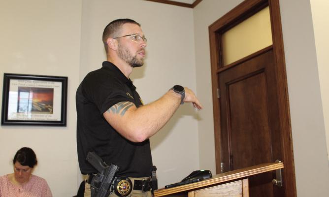 Van Zandt County Deputy Fire Marshal Andrew Rapp discussed the need for a burn ban during the regular meeting of the VZC Commissioners’ Court Oct. 22. Following Rapp’s presentation, the commissioners’ court voted 3-0, with one abstention, to implement an immediate burn ban for VZC. Photo by David Barber