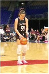 Kara Nixon (55), the Martins Mill Lady Mustang sophomore, prepared to shoot a free throw Feb. 27 against Farwell in the Class 2A, Division 2, State Championship game in San Antonio. Nixon finished with nine points and seven rebounds as the Lady Mustangs captured back-toback state titles with a hard-earned 43 41 overtime victory over Farwell.