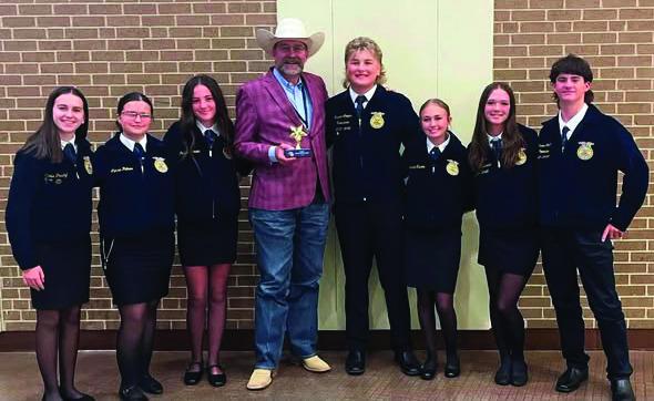 Wills Point ISD Superintendent Richard Cooper was recognized as the Area VI Star Administrator recently during the 98th Texas FFA State Convention. The Area Star Administrator Award is presented to school administrators who go above and beyond in supporting agricultural education and FFA. Cooper is shown with members of the Wills Point FFA Chapter. Courtesy photo