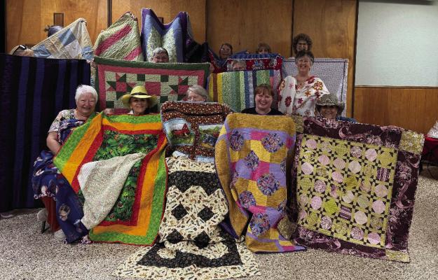 The Texas Star Quilters Guild of Canton have been making and donating quilts to the victims of the July 4 flood in Kerrville. The ladies who have been working on the quilt donations included front row, left to right, Sherry Myers, Susan Gibson, Dee Wooten, Krista Smith, and Sydney Stilling; and second row, Sue Norton, Virginia Ledbetter and Ginger Clayborn; and back row, Kay Anderson, Janet Bragdon, and Kay Rodgers. Courtesy photo
