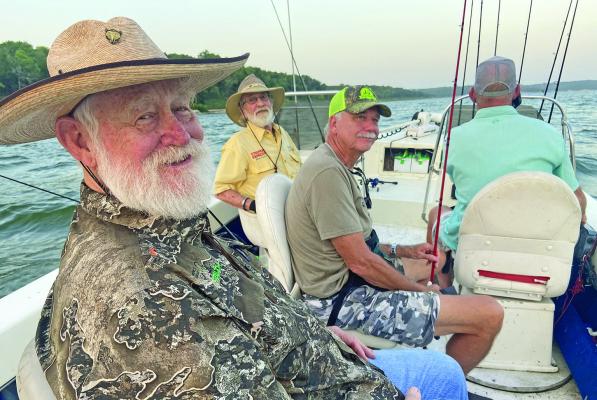 Luke and some great friends, Larry Weishuhn aka. “Mr. Whitetail in foreground, Bill Carey, Jeff Rice and our guide Todd Mehalko enjoyed some great striper fishing last week at Lake Texoma with Striper Express. Photo by Luke Clayton
