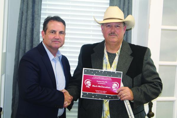 A ‘Certificate of Appreciation’ was presented to Mark McClanahan (right) following McClanahan’s resignation announcement from the Van School Board June 19 during the board’s regular monthly meeting. Presenting the certificate is Van ISD Superintendent Don Dunn. Photo by David Barber