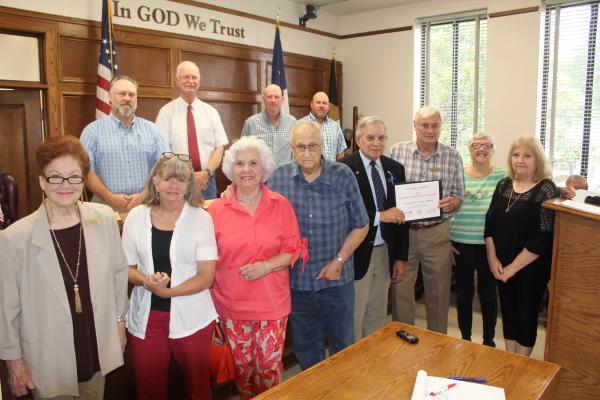 The Van Zandt County Historical Commission was recognized for their outstanding work by the Texas Historical Commission for the 15th year in a row. VZC Judge Andy Reese presented the certificate from the state to VZC Historical Commission Chairman Elvis Allen during the regular meeting of the VZC Commissioners Court June 21. Photos by David Barber
