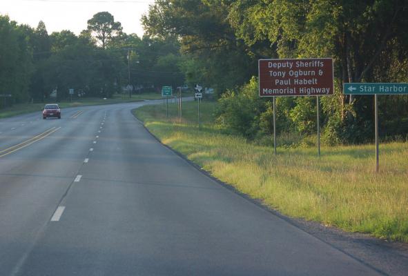 MEMORIAL HIGHWAY SIGN HONORS FALLEN OFFICERS