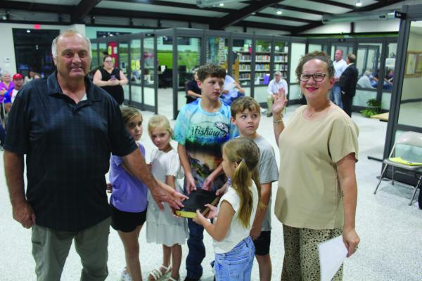 Van Mayor Ernie Burns, accompanied by his grandchildren, prepared to take the oath of office administered by Van City Secretary Sereca Huff-Huggins during the regular monthly meeting of the Van City Council June 12. Burns, who served as Mayor Pro-Tem and Acting Mayor since July 2024, was elected to a full two-year term in office May 3. Photos by David Barber