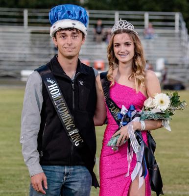 Brian Fincher and Hannah Barron pose together on the field after being named the 2022 Fruitvale High School Homecoming King and Queen. Photo by Faith Caughron