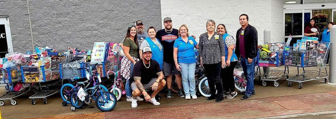 Dylan Wheeler, along with friends, bought over 1000 toys on Dec. 10 at Canton’s Walmart, in support of the Tunes for Tots Toy Drive. Courtesy photo