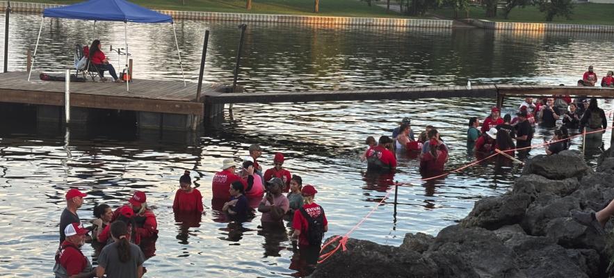 Baptisms in progress at South Lake Tawakoni. Photos by Andy Reese