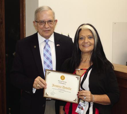 Jessica Deville was recognized for her five years of service as Van Zandt County Human Resources Director Dec. 17 during the regular meeting of the VZC Commissioners Court. Presenting Deville with a ‘Certificate of Appreciation’ was VZC Judge Andy Reese. Photos by David Barber