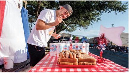 Canton’s annual Fourth of July Celebration, sponsored by the Chamber of Commerce, included a hot dog eating contest. Joel Hansen would take the overall title for the third consecutive year during the event, finishing with 40 hot dogs eaten during the 10-minute contest. Photo by Faith Caughron