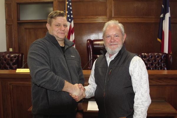 Kevin Palmer (left) was introduced as the new full-time Van Zandt County Fire Marshal Jan. 3 by VZC Pct. 2 Commissioner Cliff Williams. Palmer will officially begin his full-time duties on Jan. 22 even though he is already working part-time in the position. Palmer comes to VZC from the Gladewater Fire Department where he served as captain and fire marshal. Photo by David Barber