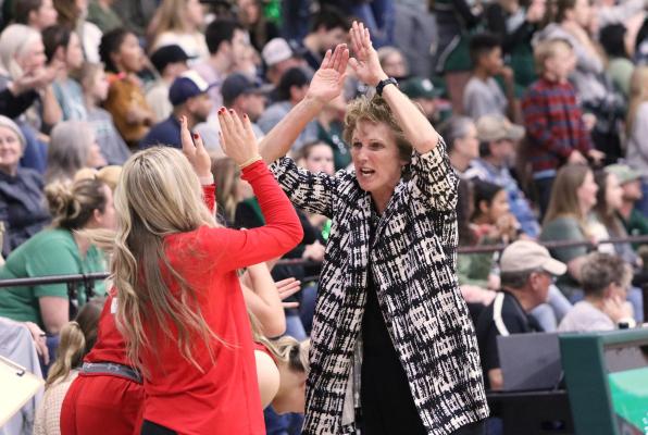 Van coach Kay Bachert had plenty to celebrate last week as her team moved up into a first-place tie in this year’s District 16-4A race. The Lady Vandals extended their win streak to eight consecutive games over the week, outdueling Canton in a thriller before rolling past Cumberland Academy. Photos by Liz Hinch
