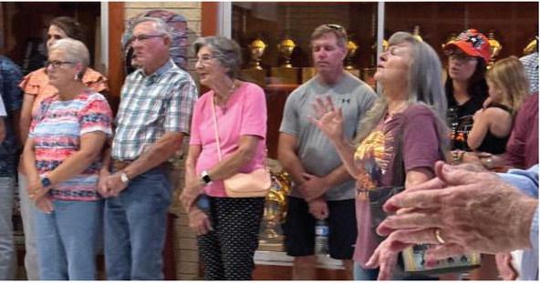 Community members, students, parents and staff walk between buildings during Grand Saline's fourth annual Prayer Rally. Local ministers prayed over each campus building during the event, which drew about 100 participants. Courtesy photos