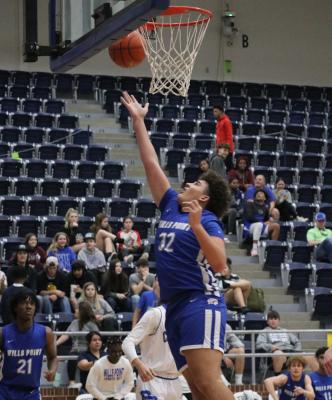 The Wills Point Tigers took two big steps forward in their quest for a district title last week, outdueling Caddo Mills 49-41 on the road before dominating Farmersville 54-29 to cap Hoopcoming week. Photo by David Kapitan