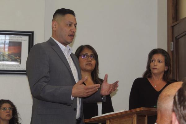 Tony Cervantes of Hart Intercivic in Austin discussed his company’s proposal for new election equipment during a special called meeting of the Van Zandt County Commissioners Court Aug. 23. In a 3-2 vote, the commissioners’ court approved the purchase. Photo by David Barber