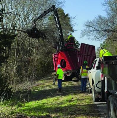 Debris cleanup work began on VZCR 2318 following last year’s storms in Van Zandt County. Significant tree damage from the May and June storms in 2024 was reported. Local, state, and federal disasters were declared due to the damage in VZC and many surrounding counties. Courtesy photo