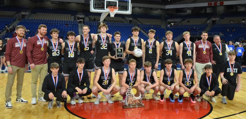 The Martins Mill Mustang boys’ basketball team players and coaches received their Gold Medals March 6 following their 55-43 victory over two-time defending state champion Li-pan at The Alamodome in San Antonio. Martins Mill won the Class 2A, Division 2, State Championship for the first time since 1949. For more information, see pages 1B and 2B, as well as next week’s issue. Photos courtesy of the Martins Mill High School Yearbook Staff