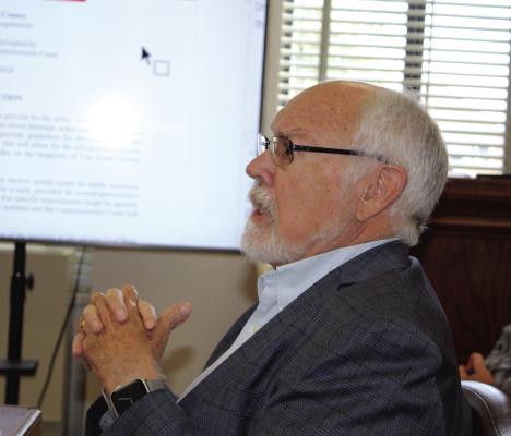 Robert T. Bass, representing Allison, Bass &amp; Magee L.L.P. Attorneys at Law of Austin, met with the Van Zandt County Commissioners Court during a special called meeting June 26 to discuss proposed subdivision regulations in unincorporated areas in VZC. Following a one-hour public hearing, the commissioners’ court approved the proposal. Photo by David Barber