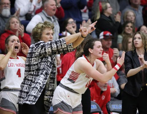Coach Kay Bachert and Ella Barrett (41) deliver instructions to players on the court during Van’s 38-33 loss to Dallas Pinkston. Photo by Liz Hinch