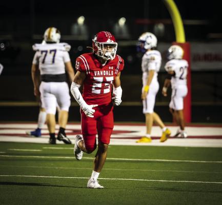 Van Vandals reserve running back Adam Beall heads to the sidelines after running 74 yards for a touchdown during fourth quarter action Nov. 1 at home against Paris North Lamar. Photo by Hi5 Photography/Liz Hinch