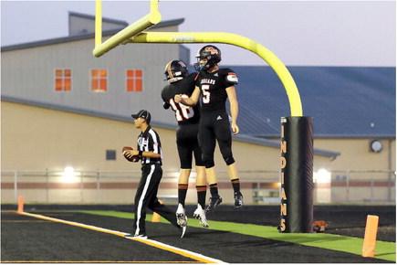 Jett Taylor and Macoy Lewis celebrate a Grand Saline Indian touchdown Sept. 8 during their 33-12 victory over the Rains Wildcats. The Indians traveled to Eustace Sept. 15 before returning home for their annual Homecoming game Sept. 22 in a 7:30 p.m. kickoff against the Quitman Bulldogs to open district play. Photo by Billy York / Big D Photo