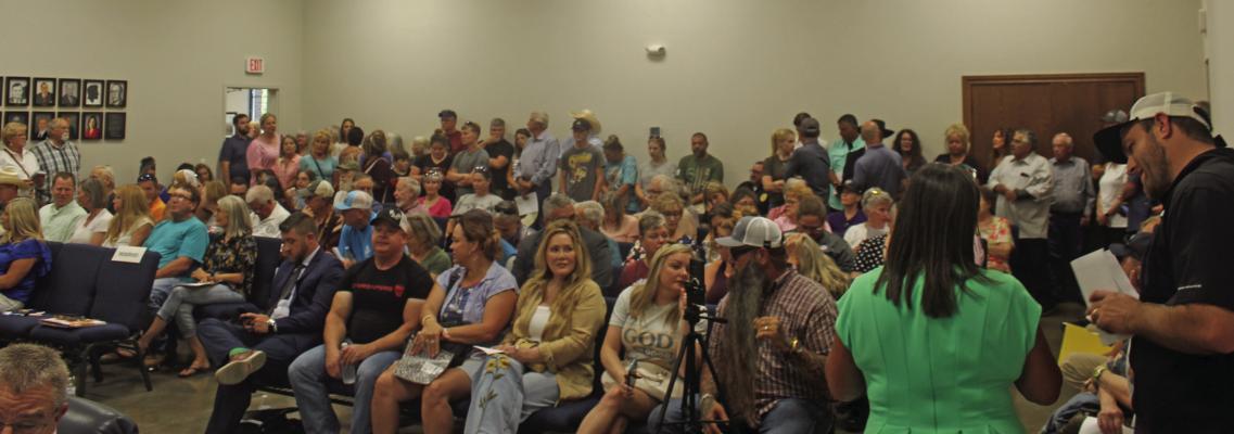 An overflow crowd was in attendance July 15 for the regular monthly meeting of the Canton City Council at Canton City Hall. The primary discussion item at the meeting had to do with the highly debated Grand Saline Creek Reservoir project the city has been involved in. A number of residents living in the reservoir project area voiced their objections to the city’s extensive long-term water resource strategy referencing a comprehensive water study initiated in 2004. Photo by Susan Harris