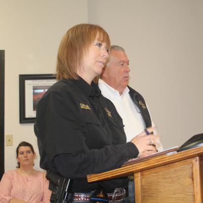 Van Zandt County Sheriff’s Department Captain Melonie Williams and VZC Sheriff Joe Carter discussed the need to exceed their budget by 25 percent to address automotive maintenance needs as well as the need to repair and maintain buildings at the VZC Jail. The VZC Commissioners Court approved the requests unanimously during their Dec. 18 regular meeting. Photo by David Barber