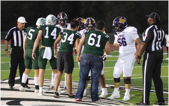 Captains for the Canton Eagles and the Center Rough Riders met at the center of the field for the pre-game coin toss leading up to kickoff of the Homecoming football game Sept. 22 at Norris Birdwell Stadium. The Eagles lost to Center, 57-34, and will play at Van Sept. 29 in a 7:30 p.m. kickoff. Photo by Lianna Reid