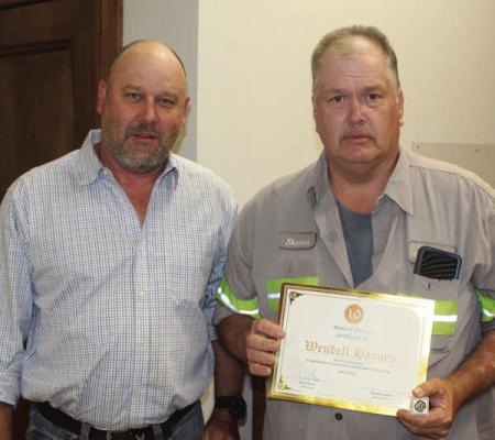 Van Zandt County Pct. 4 Employee Wendall Haynes (right) was recognized for his 10 years of service in VZC during the regular meeting of the VZC Commissioners Court April 23. VZC Pct. 4 Commissioner Brandon Barton presented Haynes with a ‘Certificate of Appreciation.’