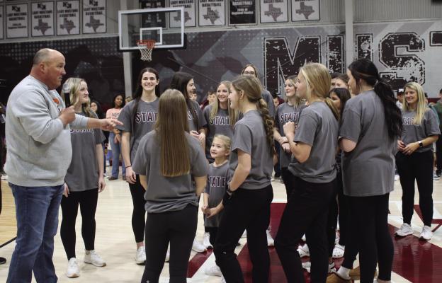 The Martins Mill Lady Mustangs received words of encouragement from the community Feb. 28 before boarding their bus for San Antonio and the Class 2A Girls’ State Basketball Tournament. The Lady Mustangs competed March 1, 2 for the opportunity to come home with a state championship trophy. Photo by Susan Harris