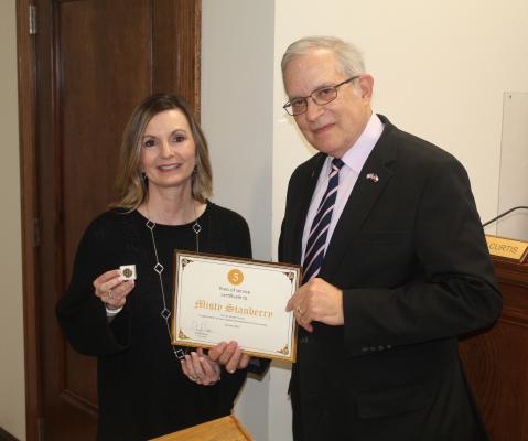 Van Zandt County Tax Assessor-Collector Misty Stanberry was recognized for her five years of service to VZC by VZC Judge Andy Reese. Stanberry was recognized during the regular meeting of the VZC Commissioners’ Court Feb. 26. Photo by David Barber