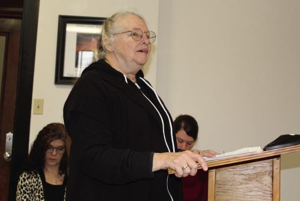 Van Zandt County Genealogical Society President Carrie Anne Wilson-Woolverton presented the society’s annual report for 2023 to the VZC Commissioners Court during its regular monthly meeting Feb. 28. Photo by David Barber