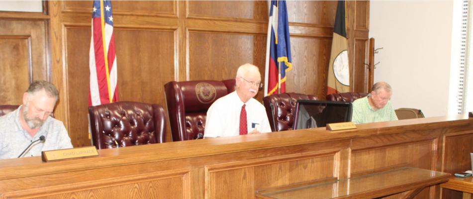 The Van Zandt County Commissioners Court held its regular meeting July 20 with barely a quorum in attendance. Shown left to right are VZC Pct. 1 Commissioner Chad LaPrade, VZC Pct. 2 Commissioner Virgil Melton Jr. and VZC Pct. 4 Commissioner Tim West. VZC Judge Don Kirkpatrick and VZC Pct. 3 Commissioner Keith Pearson were not in attendance. Photo by David Barber