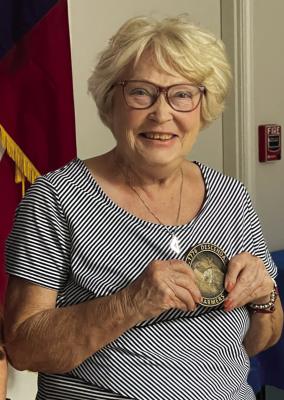 Nell Carter receives a plaque from the National Society Descendants of American Farmers. Courtesy photo